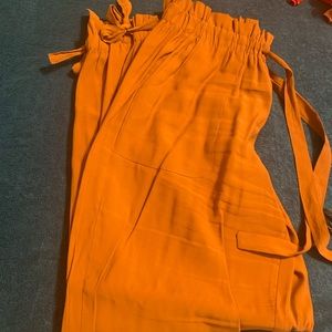 Dry Goods orange cropped dress pants, size medium. Only worn once.